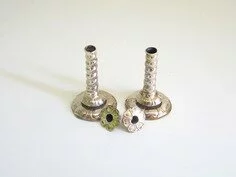 Silver pair of miniature candlesticks